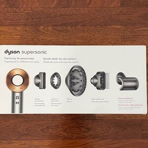 Brand new Dyson Supersonic hair dryer.  In box and packing has not been opened.